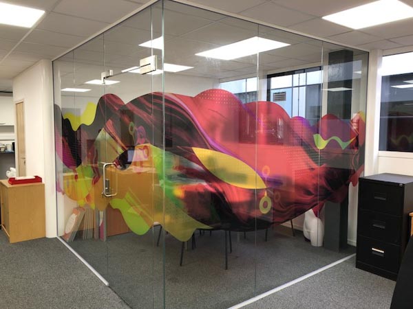 Glass office with printed colour graphics