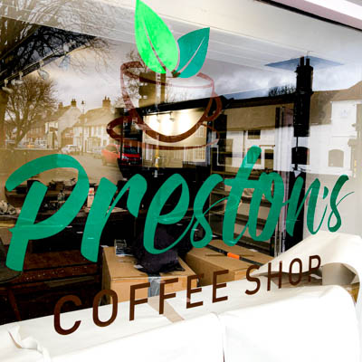 Prestons coffee shop window sign using coloured cut vinyl graphics