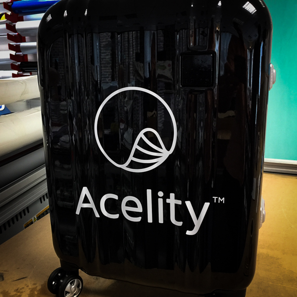 Suitcase with cut vinyl graphics applied